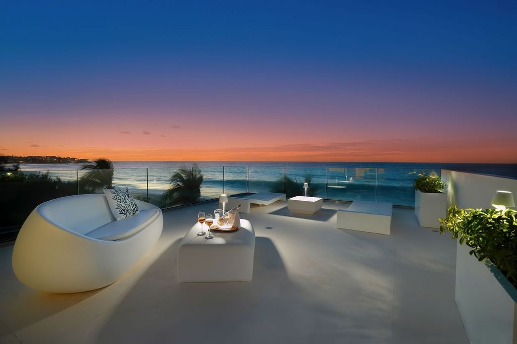 The Beach House at sunset Little Harbour Estate